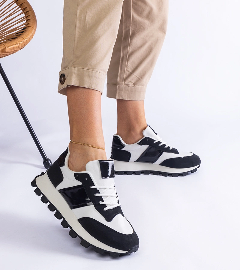 Fekete sportcipők látható protektorral Restia