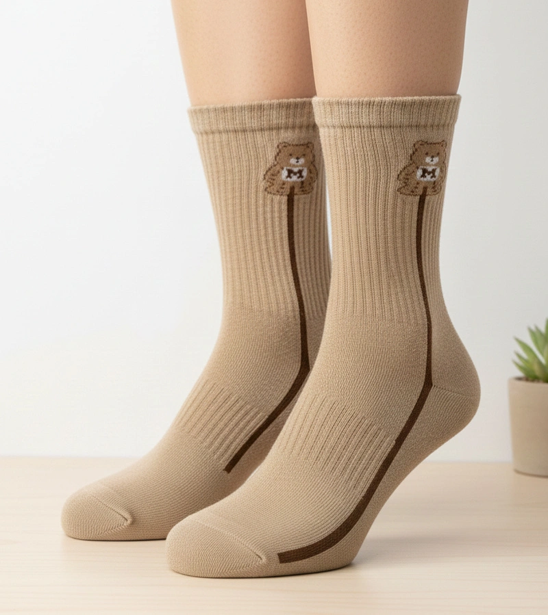 Bézs meleg zokni mackóval Sella
