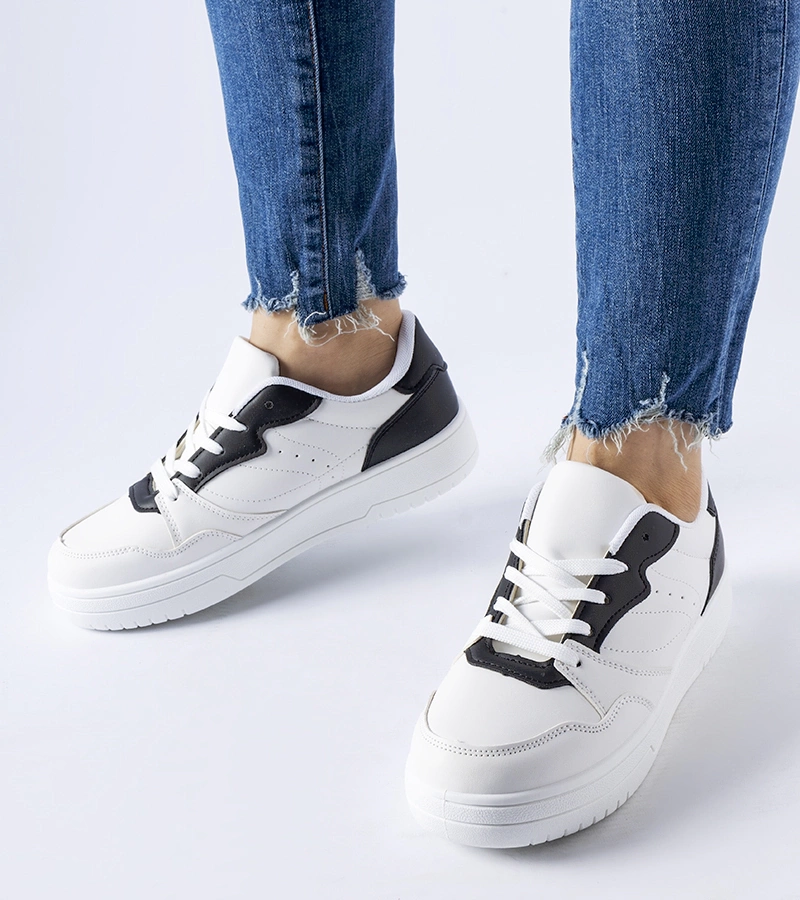 Fehér cipők fekete hangsúllyal Fournie