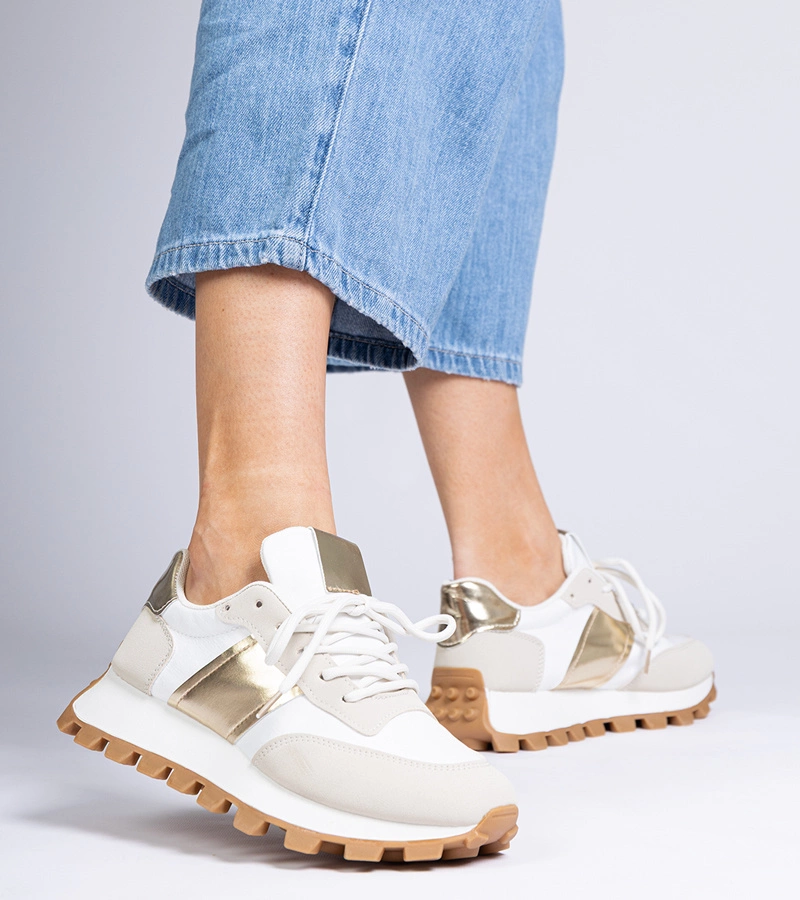 Bézs sneaker látható protektorral Restia