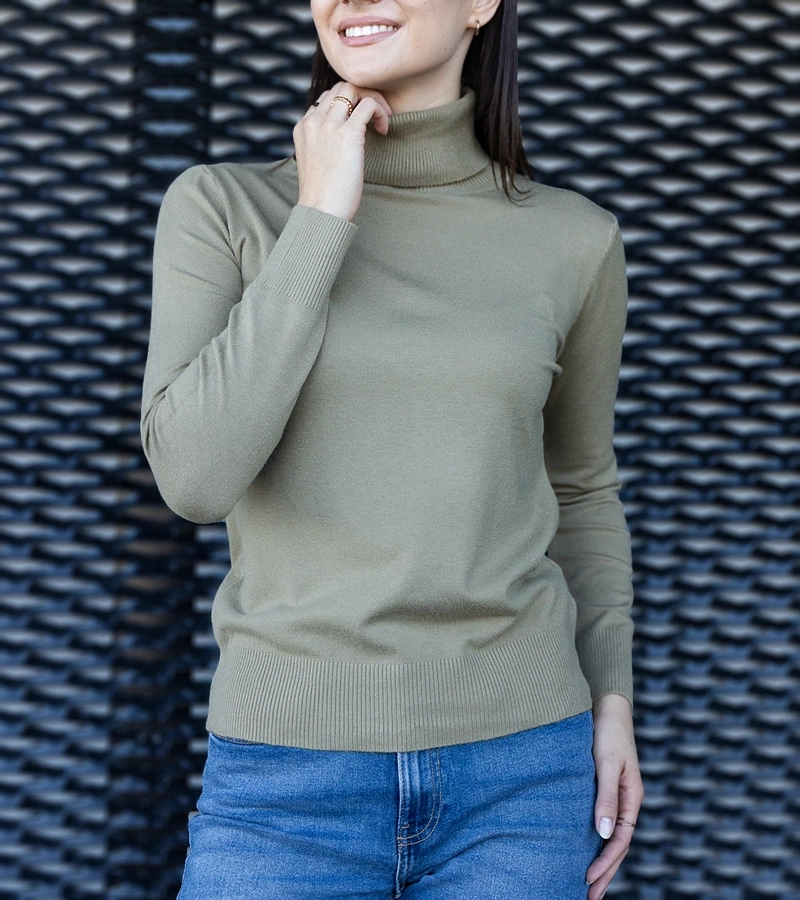 Zöld, laza szabású Nida golfpulóver.