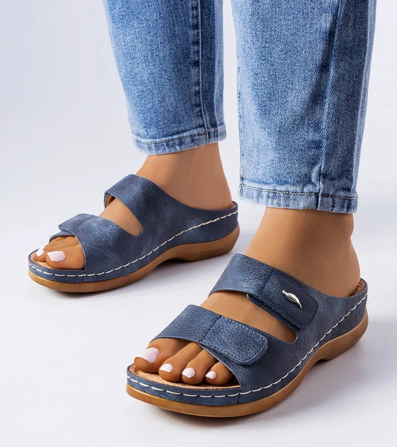 Kék alacsony sarokkal rendelkező Fréchette papucsok