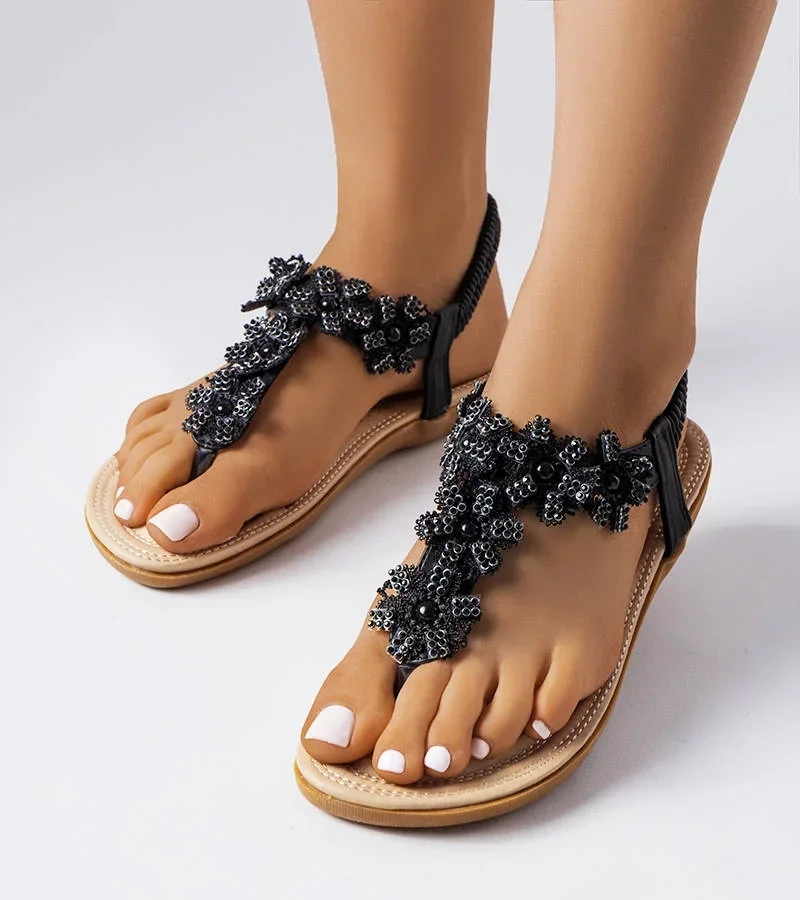 Fekete virágos Hervieux szandál