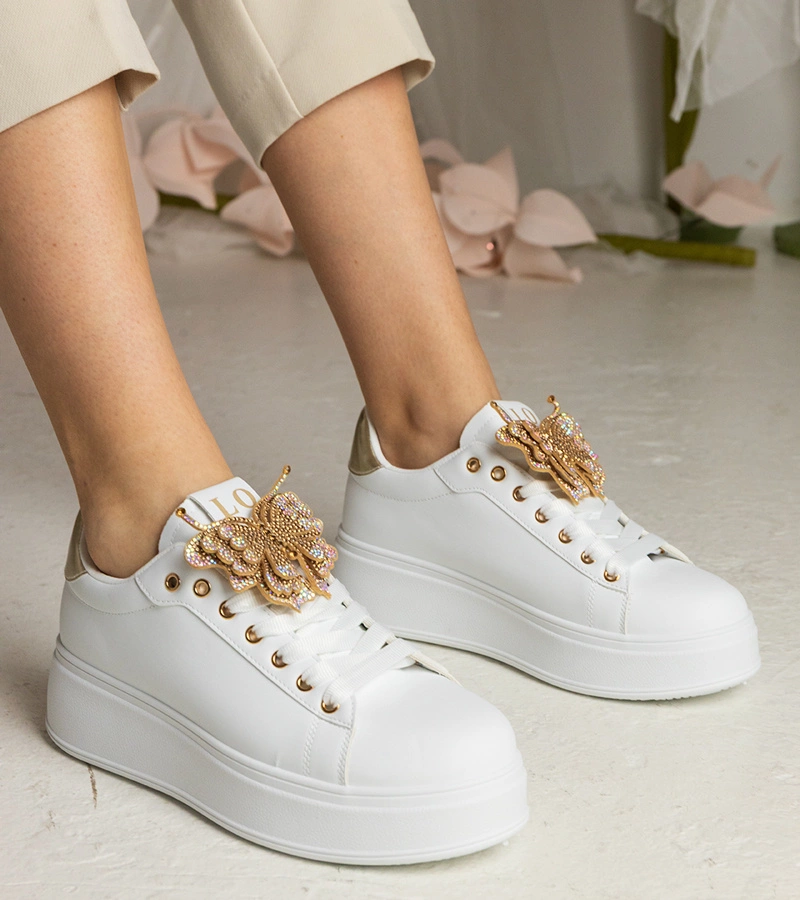 Fehér-arany tornacipő cirkóniás pillangóval díszítve Kariba