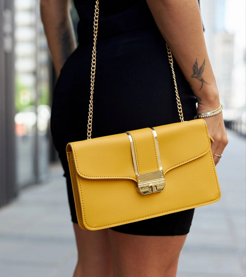 Elmia sárga válltáska láncal