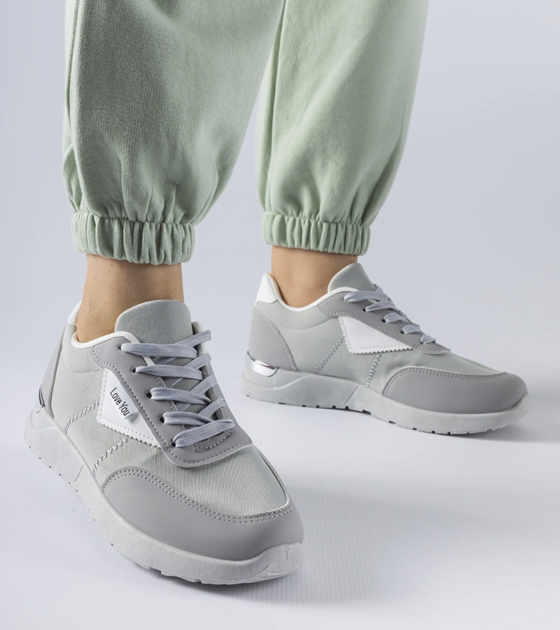 Szürke anyagból készült Geraldino tornacipők