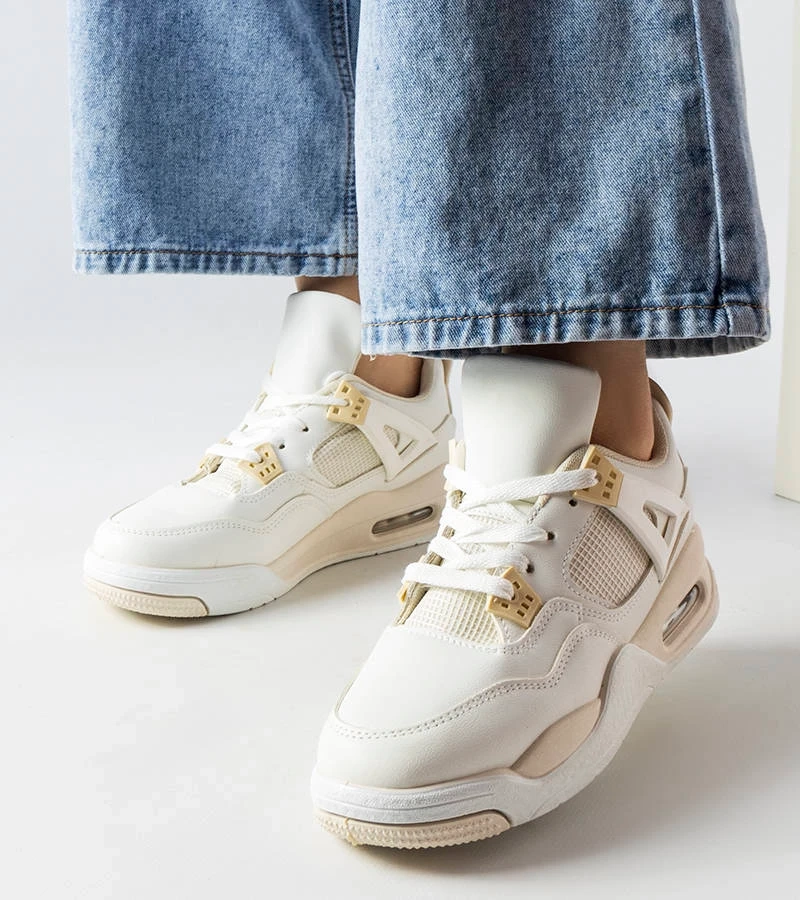Malas összetett anyagokból készült bézs sneakers.